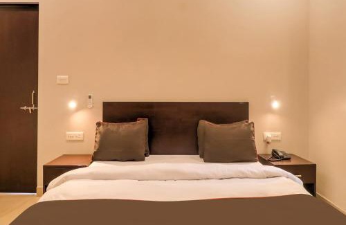Auli Hotel | Super Townhouse Amaraa Farms Near LuLu Hypermarket