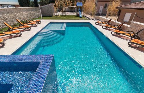 Valtura Villa | Superb villa Maxima with private pool, sauna, jacuzzi, playground for up to 18 persons, extra pool heating available