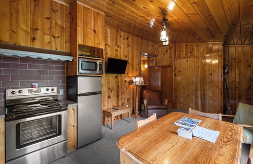 Ennis Cabin | Superior Kitchen cabins with King bed, overlook of lush Bear Creek Meadow