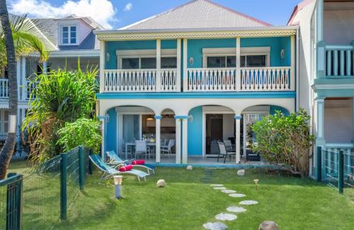 Orient Bay House | Sur la plage de la Baie Orientale, maison 4p avec jardin privatif et citerne d'eau !