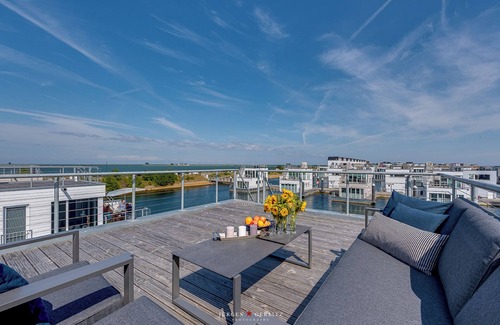 Olpenitz House | Surfer's Bay- floating house, sauna, roof terrace with water view, beach chair
