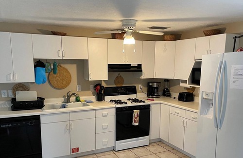 Suwannee House | Suwannee Whole House with water sunset view & boat house Lift w/ Slings
