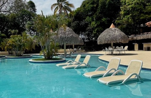 Playa Coronado Apartment | Swim Up Suite 1115 with Golf for 2 and exclusive rights to all amenities!