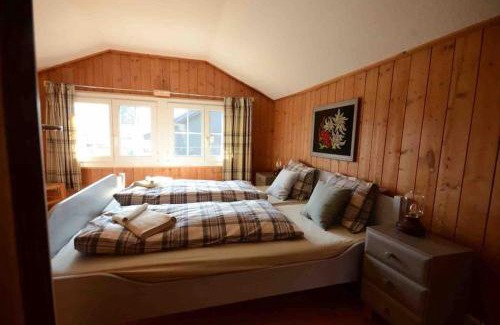 Unterseen Ski Chalet | Swiss Traditional Chalet with Alpine Mtn View