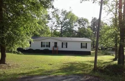 Manning House | Take a relaxing vacation in a quiet rural neighborhood-public boat dock nearby!