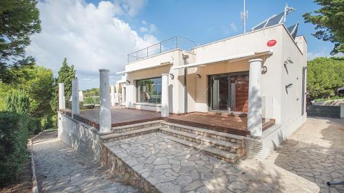 Torredembarra Villa | TarracoHomes, TH52 Villa Lighthouse con Piscina Privada, Terraza, y Vistas al Mar
