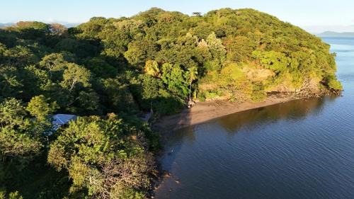 Lepanto Villa | Teak house in a forest above the beach