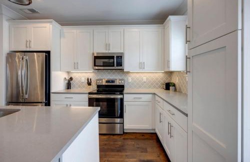Charlotte Park House | Ten Minutes to Broadway Stylish Gated Townhome