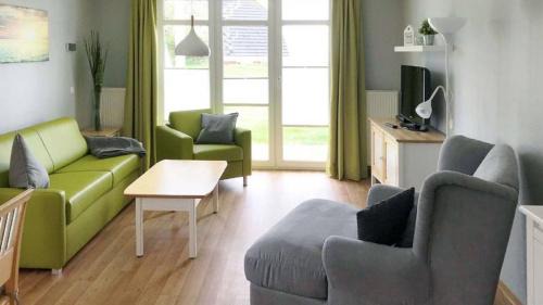 Gohren Apartment | Terrasse, gratis Nutzung vom AHOI Erlebnisbad und Sauna - Meeresblick FeWo 10