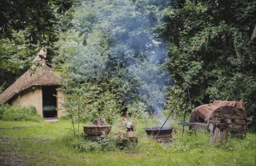 Ash Cabin | Thatched roundhouse in Somerset woodland; off-grid relaxation & campfire cooking