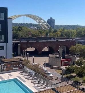 Central Business District Apartment | The 513 Flat-1BR, 1 Bath Apmt with Pool and Riverfront View Only Steps from The banks & Stadiums