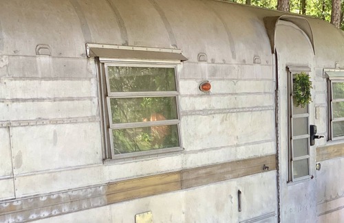 Hattiesburg House | The 67 Streamline Camper with Pool and Yard Games!