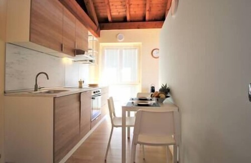 Pettenasco Apartment | The Arch in the sky for 4 people, Una vista lago unica ed un relax in giardino per godere di questo