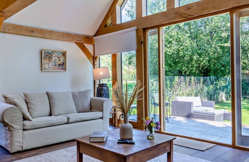 Woodmancote House | The Barn at Pigeon Cottage