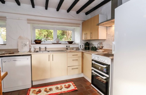 Mold House | THE BARN, character holiday cottage in Llanarmon-Yn-Ial