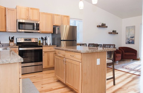 Egg Harbor Cottage | The best patio and firepit at The Cat's Lair in the woods! Level 2 EV charger!