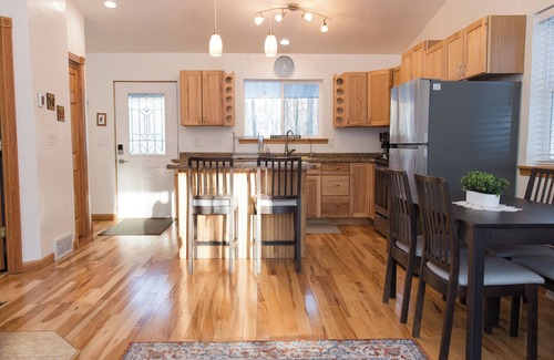Egg Harbor Cottage | The best patio and firepit at The Cat's Lair in the woods! Level 2 EV charger!