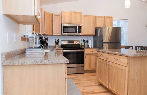 Egg Harbor Cottage | The best patio and firepit at The Cat's Lair in the woods! Level 2 EV charger!