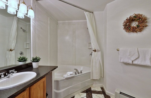 Killington Cabin | The Birch Ridge #9 - English Gentleman's Room, a cozy boutique hotel in Killington, Vermont.