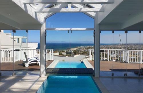 Mountainside House | 'The Bolussi Beachhouse', sleeps 12 in 6 en-suite bedrooms with Indoor Pool