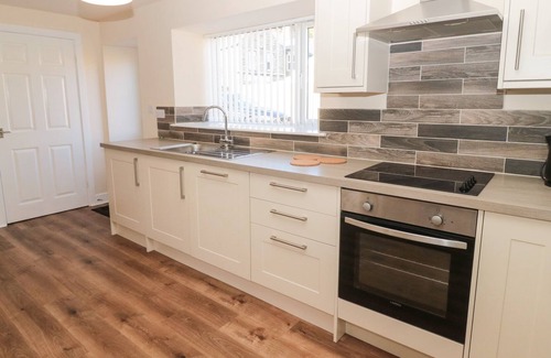 Longframlington Cottage | THE BUNGALOW, pet friendly, with a garden in Longframlington