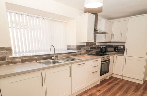 Longframlington Cottage | THE BUNGALOW, pet friendly, with a garden in Longframlington