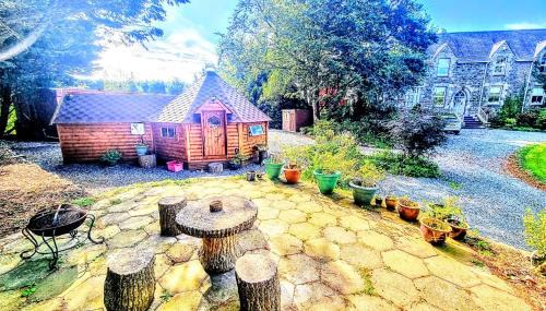 Pentre Berw Other | The Cabin & hot tub at Ashleigh House