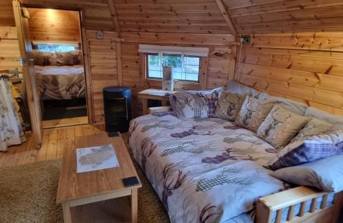 Pentre Berw Other | The Cabin & hot tub at Ashleigh House