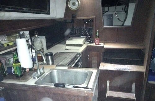 Stuart Boat Rental | The Classy Sailor a 31' Sloop at dock in Manatee Pocket Entertainment District