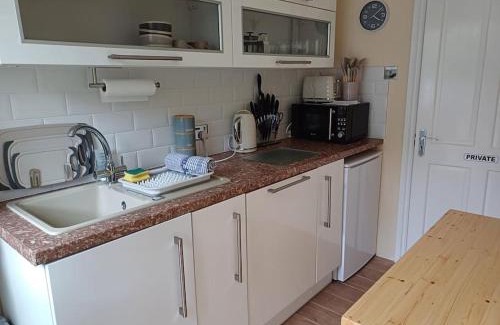 St. Blazey Apartment | The Conifers 3 Room Small but Stylish Self Catering Bedsit Flat in Nature Reserve Free Eden taxi b4 9pm no lounge