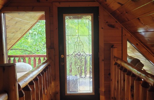 Sevierville Cabin | The Cozy Cub is a cozy 2-bedroom secluded cabin in charming Sevierville