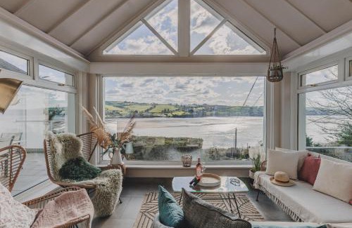 Teignmouth House | The Curlews - Waterside, boutique home with 10 person spa