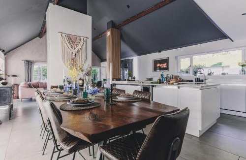 Teignmouth House | The Curlews - Waterside, boutique home with 10 person spa