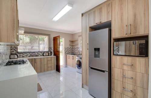 Greater Johannesburg Metropolitan Area House | The Cycad. 4-Bed Home next to Clearwater Mall
