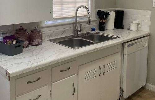 Heart of Lubbock Apartment | The DAX "Guns up"
