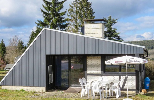 Ferienhausgebiet Hillenseifen House | The detached vacation home with garden and spacious terrace is located in the forest holiday park in