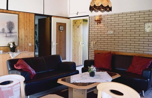 Ferienhausgebiet Hillenseifen House | The detached vacation home with garden and spacious terrace is located in the forest holiday park in