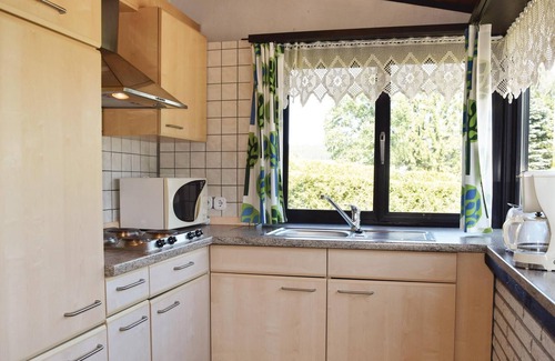 Ferienhausgebiet Hillenseifen House | The detached vacation home with garden and spacious terrace is located in the forest holiday park in