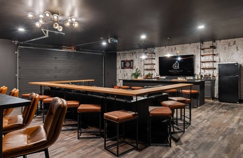 Logan House | The Distillery + Golf Simulator l Hot Tub