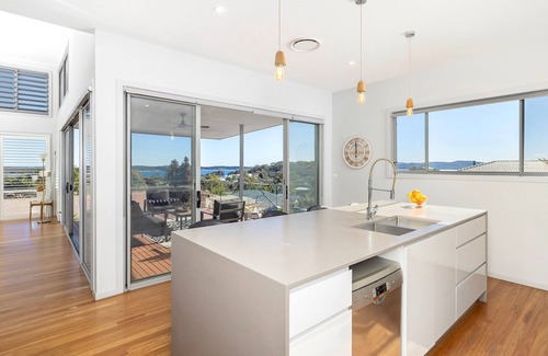 Corlette House | The Family Tide – large family home, entertaining deck with views, swimming pool, air conditioning