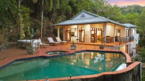 Clifton Beach House | The Ferns Villa Serene Rainforest Retreat with Ocean Breezes