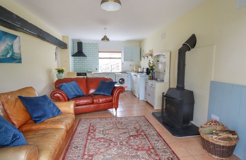 Tintagel Cottage | THE GARDEN APARTMENT, pet friendly, with open fire in Tintagel