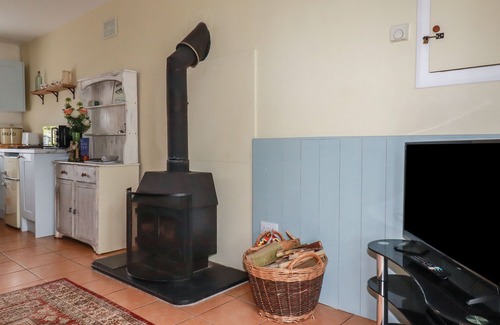 Tintagel Cottage | THE GARDEN APARTMENT, pet friendly, with open fire in Tintagel
