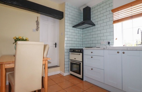 Tintagel Cottage | THE GARDEN APARTMENT, pet friendly, with open fire in Tintagel