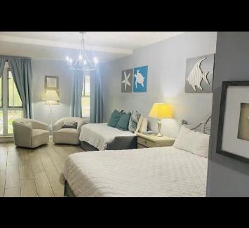 Baytowne Wharf Resort | The Grand Sandestin Golf & Beach Resort Studio sleeps four shuttle to private beach
