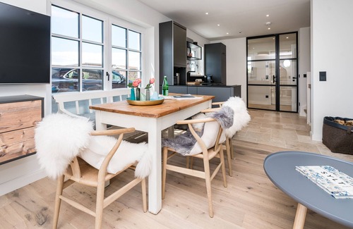 Rantum House | The great style mix of cool design pieces and Scandi style is responsible for this.