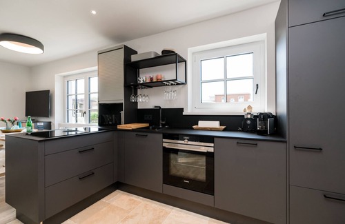 Rantum House | The great style mix of cool design pieces and Scandi style is responsible for this.