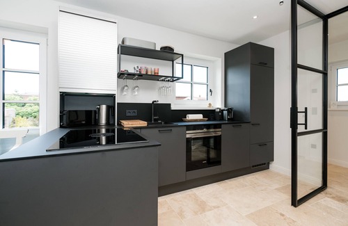 Rantum House | The great style mix of cool design pieces and Scandi style is responsible for this.