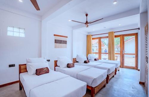 Pelena Resort | The Green Rooms Surf & Yoga Camp - ON THE BEACH - Prime location Renovated 2024