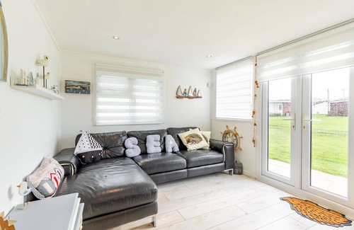 Mundesley Ski Chalet | The Happy Hedgehog (2 bedrooms sleeps up to 3) is just 600 yards from the beach!